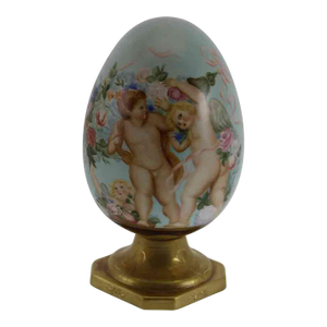 1990’s Vintage Large Easter Egg With Putti's and Angel Painting on Light Pale Blue Fond on Gold Base