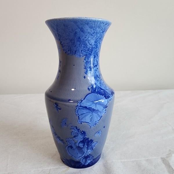 Rich cobalt-blue crystalline formations give this signed studio pottery vase an exceptionally expressive surface, with...