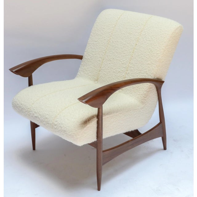 Pair of custom armchairs in walnut and ivory boucle.
