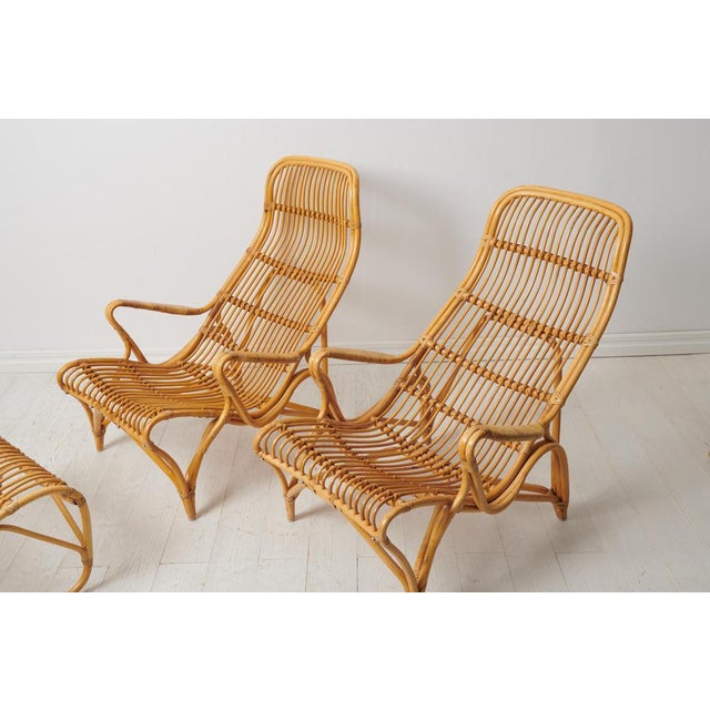 Brown Swedish Modern Rattan Lounge Chairs and Footstool attributed to Bruno Mathsson for Dux, 1970s, Set of 3 For Sale - Image 8 of 15