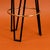 Pair of Italian Mid-Century Modern style bar stools from the 1950s. Each stool features a sleek black lacquered iron frame...