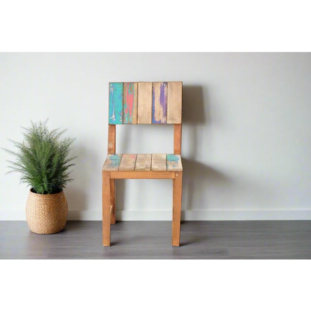 Charming primitive slat&nbsp;side chair constructed using sturdy reclaimed teak and and aged multi-color&nbsp;finish....