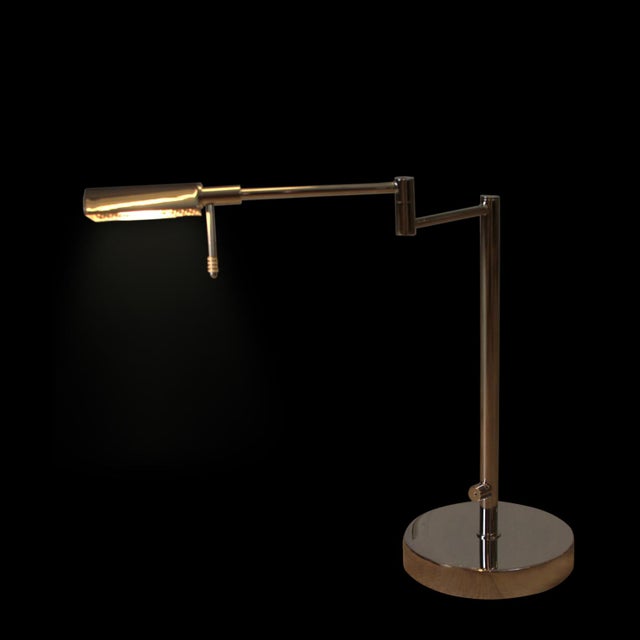 The Robert Sonneman "A Way of Light" Swing Arm Modern Desk Lamp is a quintessential piece that embodies the designer's...