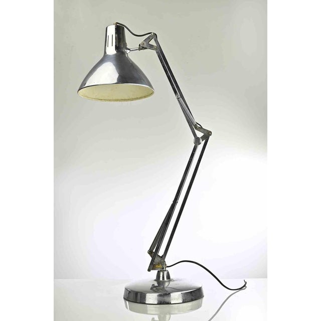Adjustable table lamp in chromed metal, Italy 1970s. Good working condition. Up to 250V (Europe/UK Standard).The wiring of...