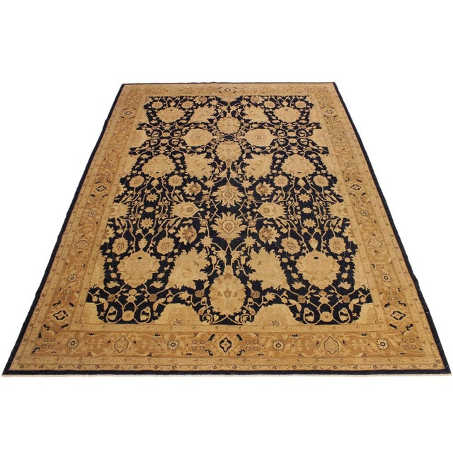 Designed with mesmerizing intricacy and gorgeous color palette, this hand-knotted masterpiece is an semi-Vintage...