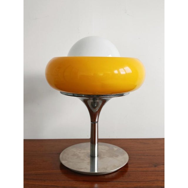 Exceptionally rare Mid Century Modern table lamp designed by Guzzini company in the 1960s. The lamp is known under several...