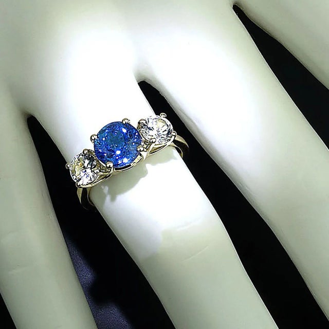 Stunning Brazilian Indicolite and Cambodian White Zircon Cocktail Ring Experience the allure of rare gemstones with this...