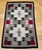 An exceptional mid-20th century Navajo (Din�) textile from the American Southwest, this finely handwoven rug showcases the...
