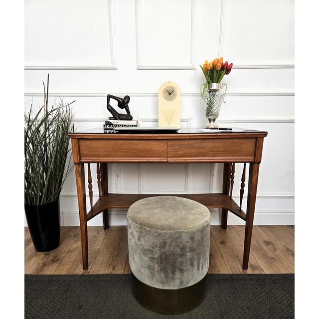 Beautiful Italian Art Deco Mid-Century Modern desk writing table, in wood with elegant refined side legs with decors,...