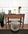 Beautiful Italian Art Deco Mid-Century Modern desk writing table, in wood with elegant refined side legs with decors,...