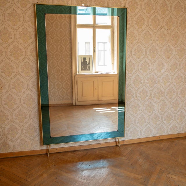 This striking vintage floor mirror was crafted by renowned Italian manufacturer Cristal Art in the 1960s and is a stunning...