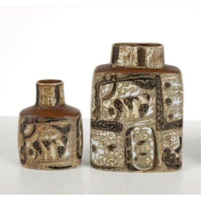 A set of four vases designed by Nils Thorsson in the 1960's for Royal Copenhagen. The vases are beautifully decorated in...