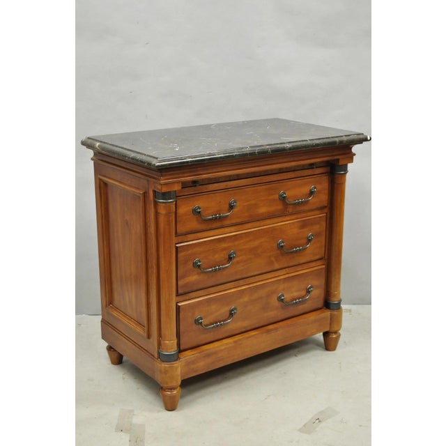 Kincaid French Country Style Cherry Wood 3 Drawer Marble Top Nightstand Bedside Table with Pull Out Surface. Circa 21st...