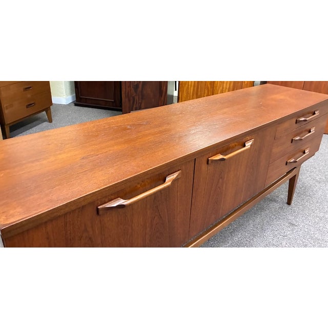 Wood Mid Century Modern Teak Credenza on Elevated Trestle Base c.1960 For Sale - Image 7 of 8