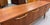 Wood Mid Century Modern Teak Credenza on Elevated Trestle Base c.1960 For Sale - Image 7 of 8