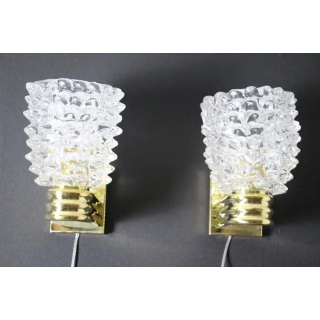 This magnificent pair of Murano glass sconces was handcrafted using the rostrato glass technique by a highly skilled...