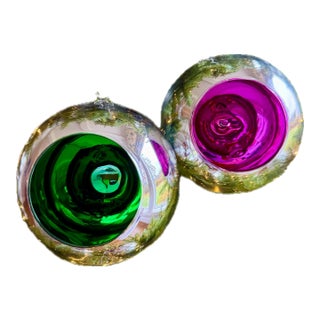 1990s Set of Two Oversized 14″ Two’s Company Blown Glass Ornaments – Silver Mirror With Green & Magenta Interiors For Sale