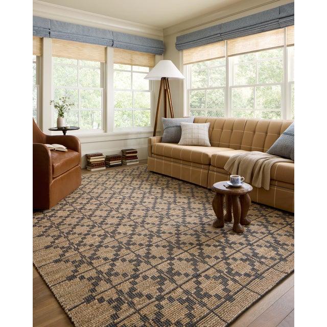 The Judy Collection from Chris Loves Julia x Loloi is a handwoven area rug made with natural fibers for an easygoing yet...