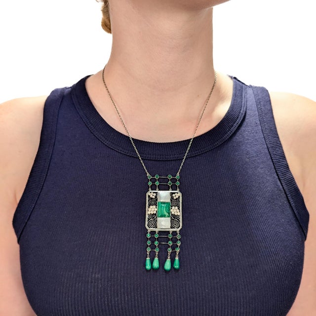 A fine signed antique German Jugendstil pendant necklace. By Theodor Fahrner. In .935 silver. In a Wiener Werkstätte or...