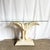 This striking Boho Chic sculpted banana leaf console table features a dramatic hand-modeled base inspired by lush tropical...