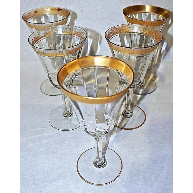 Set of 5 fine 1920-30s US made crystal wine stems, 23k gold trimming with worn gold rimmed bases.