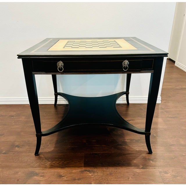 This gorgeous, versatile gaming table includes a chess / checkers reversible insert with a backgammon board underneath....