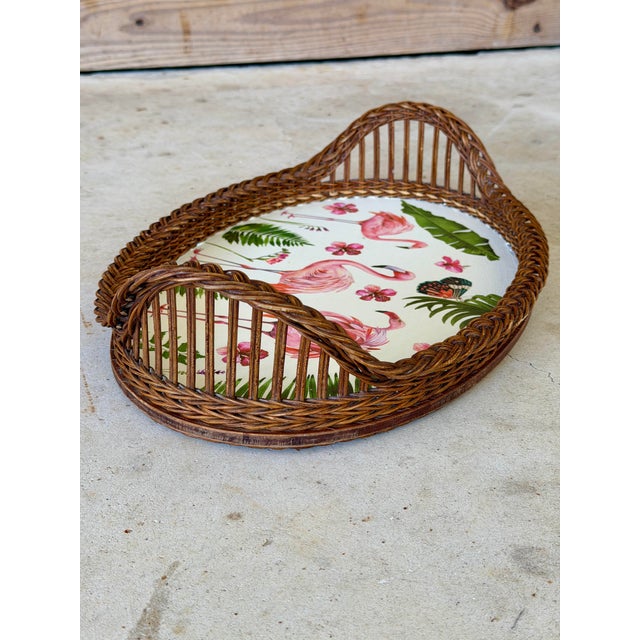 Absolutely charming vintage rattan tray featuring a custom flamingo decoupage insert. This piece blends classic woven...