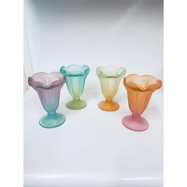 These tulip shape dessert glasses with pedestal base are made with heavyweight glass . They have a gorgeous multi color...