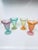 These tulip shape dessert glasses with pedestal base are made with heavyweight glass . They have a gorgeous multi color...