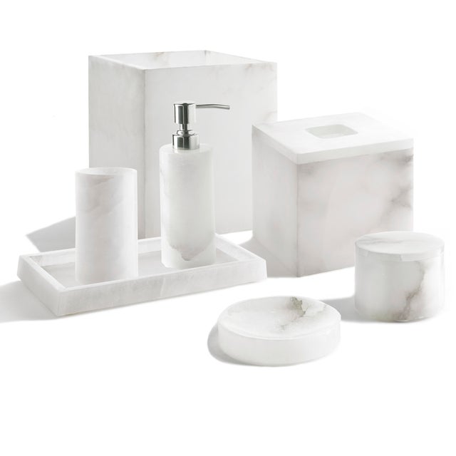 Crafted from luxuriant alabaster, the naturally marbled veining of each distinct collection piece brings artful elegance...
