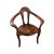 An outstanding hand sculptured armchair inspired by the Female Form. This remarkable walnut armchair has a free flowing...