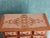 Florentine style jewelry chest consisting of 2 lower large drawers and 3 top small drawers. It is also a music box that...