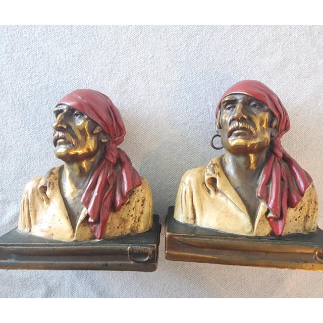 The Antique Bronze Paul Herzel Buccaneer Bookend from 1937 is a handmade collectible made of bronze. This unique piece...