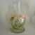 The Princess House Cottage Tulip Carafe, Goblets, and Votive Holder set is a delicate and elegant piece of pottery and...