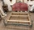 Elegant antique French bed featuring a hand-carved wood frame with original distressed painted finish in soft...