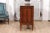 An Italian walnut commode from circa 1820 with serpentine front and carved tapered feet. Introduce a dash of Italian...