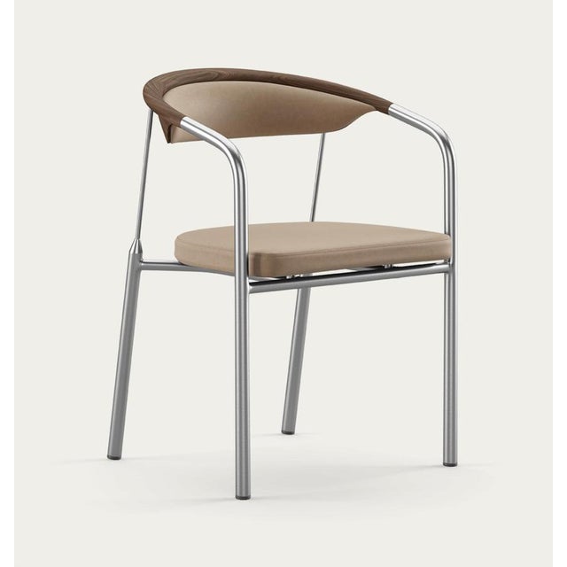 Henrik tengler chairman wood types: walnut, upholstery: lime for one collection the chairman was designed by henrik...