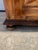 A charming Louis XIII-style 18th-century cabinet handcrafted from solid wood, featuring beautifully inlaid geometric...