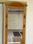 Bring classic warmth and practical organization to your foyer or mudroom with this beautifully crafted honey oak hall...