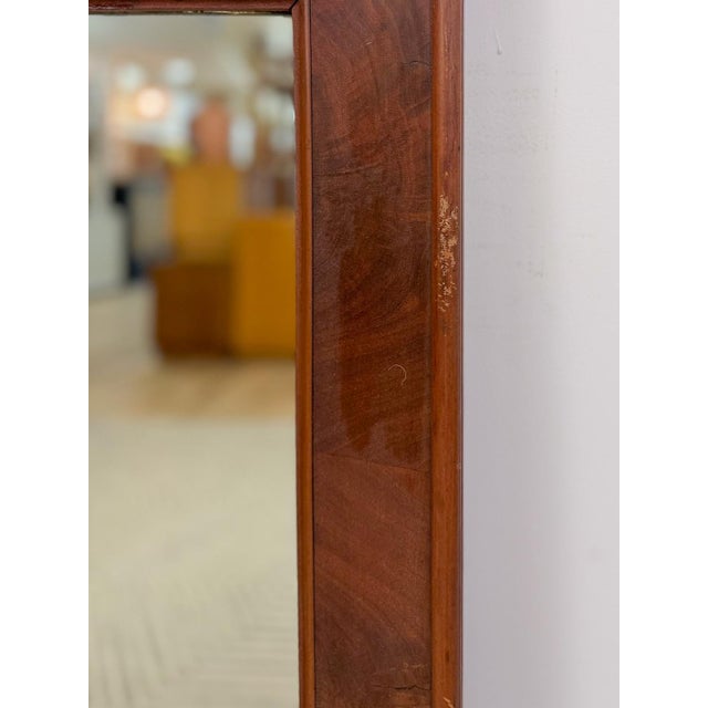 This extraordinary vintage mid-century modern tigerwood inlay mirror is a rare and breathtaking collector's piece. The...