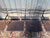 Four-seater public hall bench, made entirely of iron and sheet metal, dating from the early 20th century (1900-1920). The...