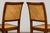Sourced in Provence, France, this set of six French Provincial dining chairs is crafted from solid walnut and embodies the...