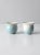 A pair of vintage studio pottery cachepots, hand-crafted in ceramic with a light blue and cream speckled glaze. Each...