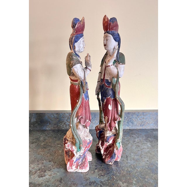 A very nice pair of antique guanyin figures in carved and polychrome painted wood. Lovely old surface and age appropriate...