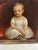 American Folk Art Portrait of a Young Child Holding a Slipper, c. 1830–1850 Oil on Canvas - In later Italian Frame....