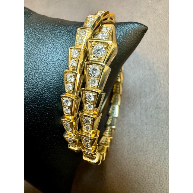 This bangle is not by Bvlgari 18k White Gold 3 Ct Pave Diamond Serpenti Viper Slim Bracelet in a size medium It will fit...