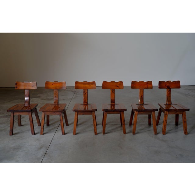 Pine T back dining chairs The chairs are in a good condition with clear traces of usage normal to their age.