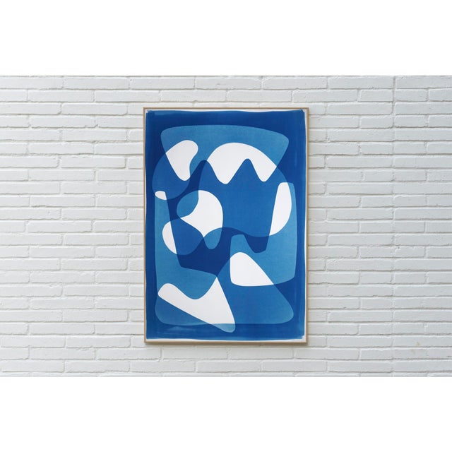 Mid-Century Shapes X is a captivating cyanotype monotype that draws on the visual language of mid-century abstraction....