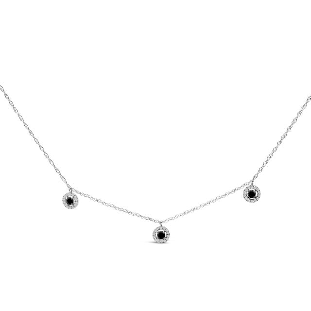 Discover the exquisite elegance of this .925 sterling silver necklace, adorned with 5/8 cttw of striking natural black...