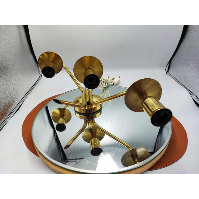 Brass triple wall lamp, vintage 70s, dimensions: height 24 cm, depth 14 cm, width 25 cm. European Plug (up to 250V).The...